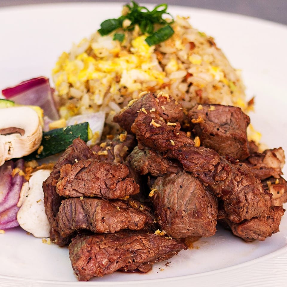 Truk N Yaki's Japanese steak and fried rice with mushrooms, zucchini, and red onion.
